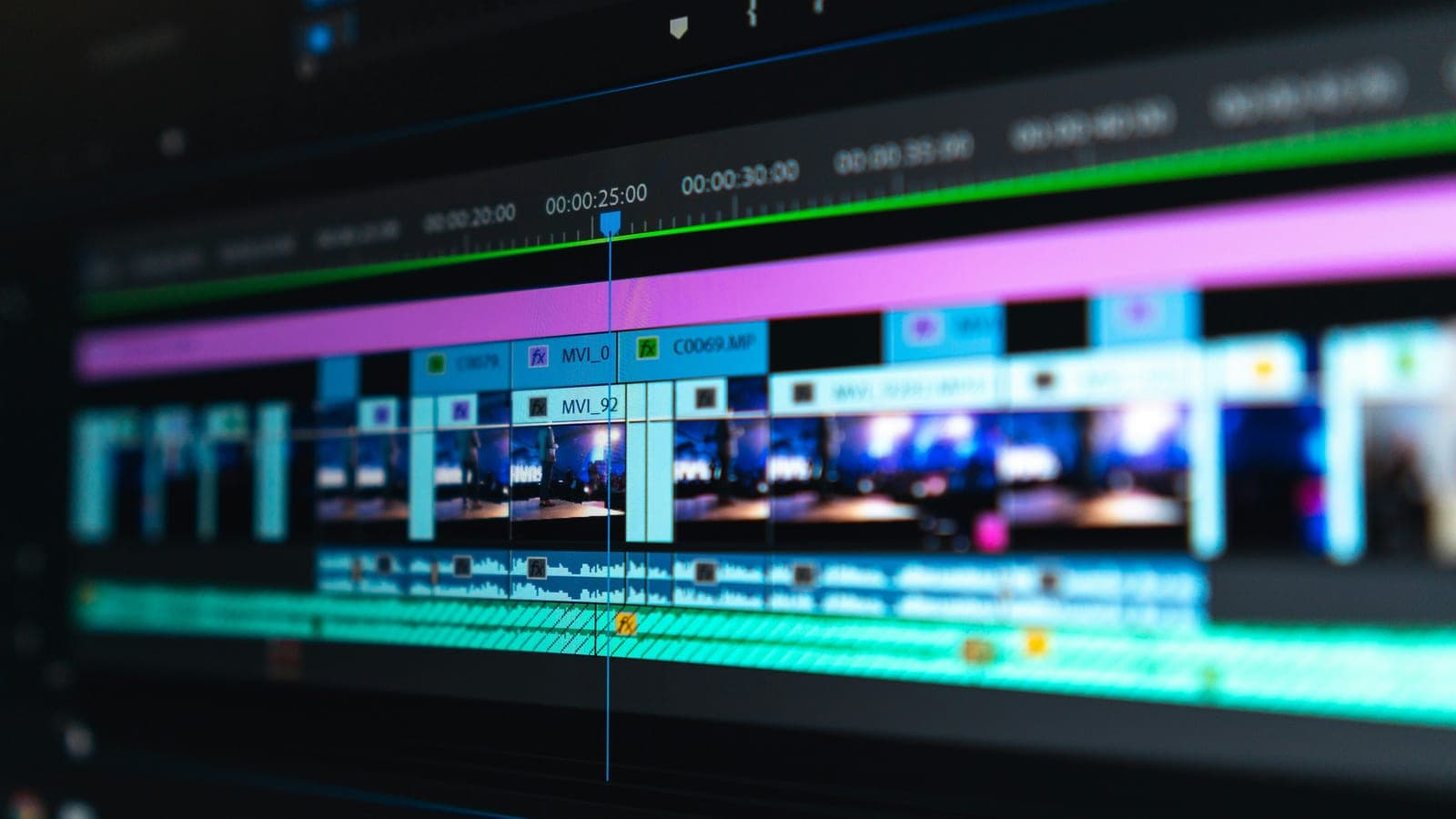 A video editing timeline on a dark screen
