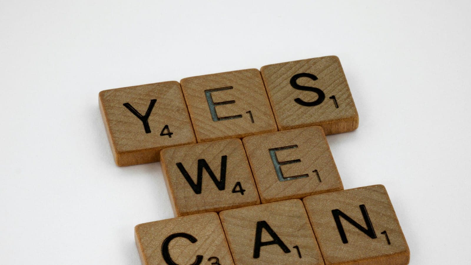 Scrabble tiles arranged on a white surface background, words, quote, letters, type, typography, design, layout, focus, bokeh, blur, photography, images, image, go for it, try, attempt, do something, do your best, impulse, self starter, first step, motivation, positivity, encouragement, encourage, don't give up, team, yes we can, we can, team work, teamwork, fellowship, community, better together,