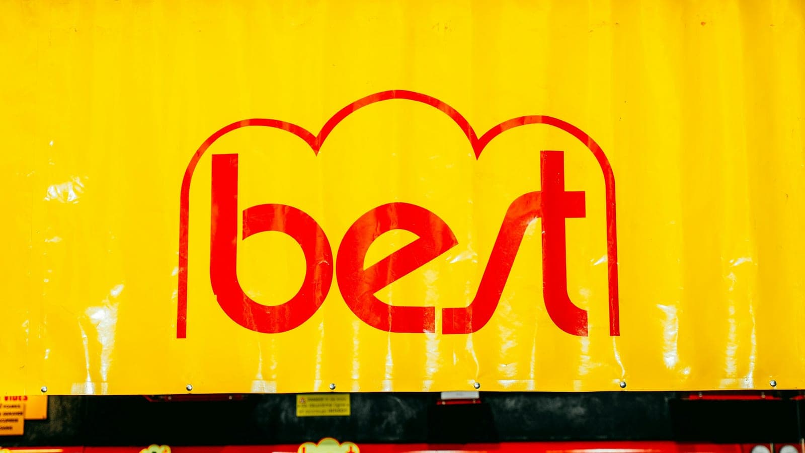 Yellow background with a red 'best' logo