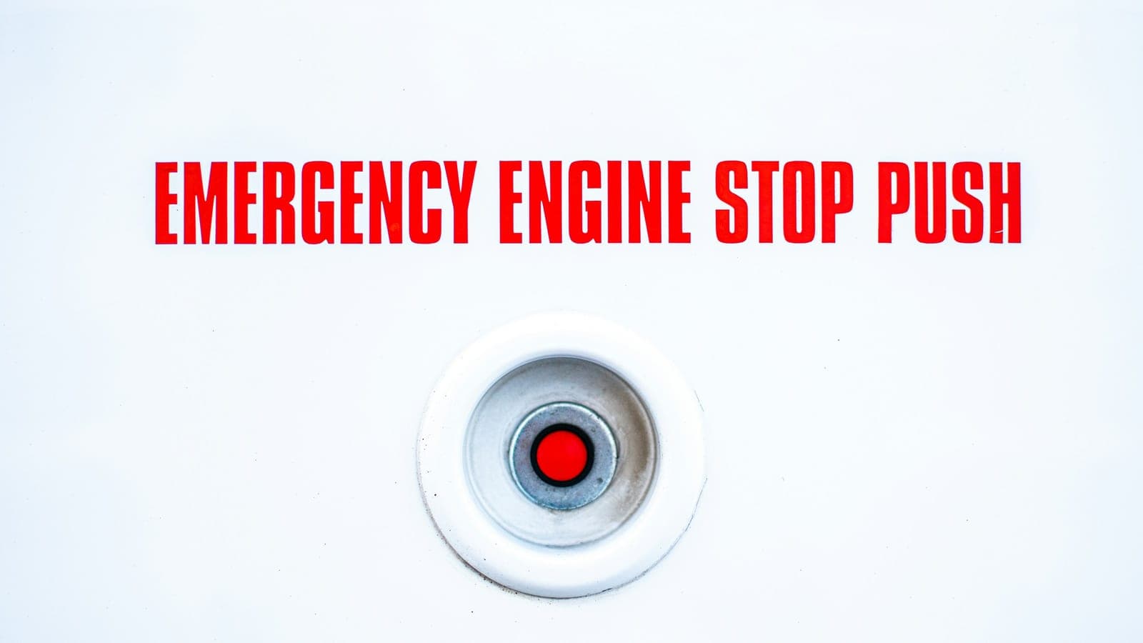 Red emergency engine stop push button
